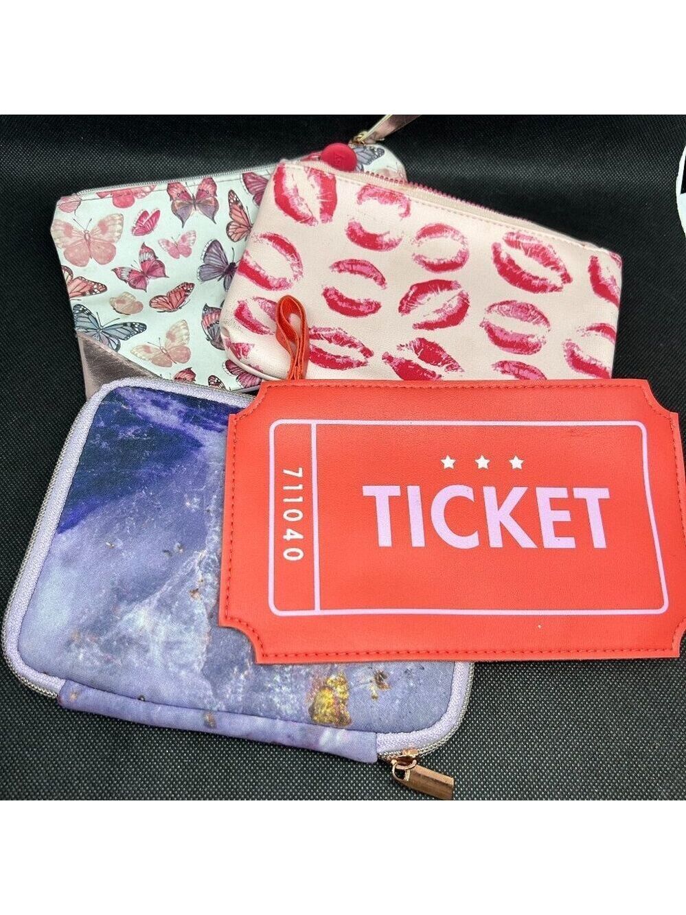 Mixed lot of Ipsy and other cosmetic/storage bags.